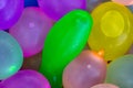 Many bright and colorful water balloons close up Royalty Free Stock Photo