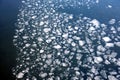 Many broken small ice floes floating on the river aerial aerial view