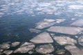 Many broken small ice floes floating on the river aerial aerial view Royalty Free Stock Photo