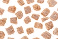 Many brown lump cane sugar cubes