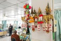 Many Buddha statues inside Thai hospital