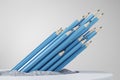 Many or bunch of blue pencils on abstract white background. Education, student, leadership and stationery concept. Royalty Free Stock Photo