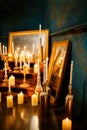 Many burning candles on a mirrored background Royalty Free Stock Photo