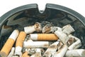 Many butts in black ashtray Royalty Free Stock Photo