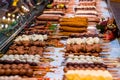 Christmas market fancy delicious food selection. Royalty Free Stock Photo