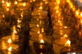 Many candle light in glass burning in the dark Royalty Free Stock Photo