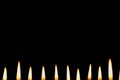 Many candleflames in a row Royalty Free Stock Photo