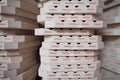 Many cardboard pizza boxes. 3D rendered illustration