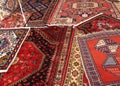 Many carpets of different quality on sale in the market Royalty Free Stock Photo