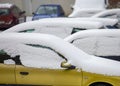 Many cars covered with snow in car park Royalty Free Stock Photo