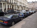 Parked Cars in Kensington Street, London, UK Royalty Free Stock Photo