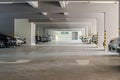 Many cars in parking garage interior building. Royalty Free Stock Photo