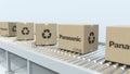 Boxes with PANASONIC logo move on roller conveyor. Editorial 3D rendering