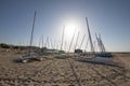 Many catamarans in the sun on the beach in Benicassim