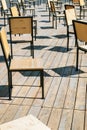 Many chairs made of plywood in the open area