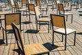 Many chairs made of plywood in the open area