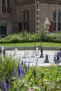 Many chessmen on the street chessboard with european building