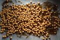 Many chickpeas with soy sauce on parchment close-up