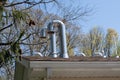 Many chimneys roof pipe house metal outdoor Royalty Free Stock Photo