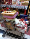 Many chocolate boxes in shopping cart