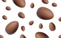 Many chocolate eggs falling on white background