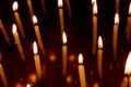 Group of burning candles in dark Royalty Free Stock Photo