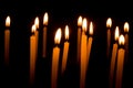 Group of burning candles in dark Royalty Free Stock Photo