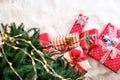 Many Christmas gift boxes on fluffy carpet