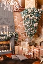 Many Christmas gifts. Winter home decor. Modern loft interior. Royalty Free Stock Photo