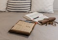 Bible and notebook laid open for bible study