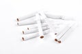 Many cigarettes on white background.