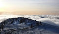 Many climbers and mountain guides arrive on the summit of Mount Kilimanjaro just after sunrise Royalty Free Stock Photo