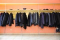 Many clothes in cloakroom Royalty Free Stock Photo