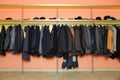 Many clothes in cloakroom Royalty Free Stock Photo