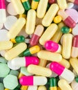 many colored drugs pills background