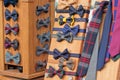 colored fabric bow ties on a brown display case Royalty Free Stock Photo