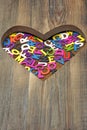 Many Colored Letters In The Wooden Heart Shape Royalty Free Stock Photo