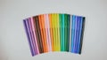 Many colored pencils are arranged around the edges of the image as a frame. In the center is an empty background with Royalty Free Stock Photo