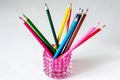 Many colored pencils lie on a white background. Copy spase. The concept of back to school, the educational process, study at Royalty Free Stock Photo