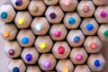 many colored pencils stacked on each other and laying next to each other Royalty Free Stock Photo