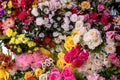 Many colorful artificial fake flowers background blooming beautiful Royalty Free Stock Photo