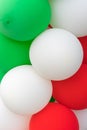 Many colorful balloons decorated wall as background. Royalty Free Stock Photo