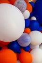 Many colorful balloons decorated wall as background Royalty Free Stock Photo