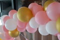 Many colorful balloons decorated wall as background. Beautiful background with colorful balloons Royalty Free Stock Photo
