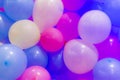 Many colorful balloons decorated wall as background. Royalty Free Stock Photo
