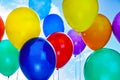 Many colorful balloons outdoors on sunny day Royalty Free Stock Photo