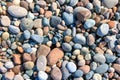 Many colorful beach rocks and pebbles Royalty Free Stock Photo