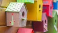 Many colorful birdhouses, wooden houses for birds as a symbol of wish fulfillment