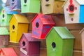 Many colorful birdhouses, wooden houses for birds as a symbol of wish fulfillment