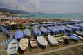 many colorful boats on the shore across the seaside view in Lavagna, Liguria, Italy. Coast view Royalty Free Stock Photo